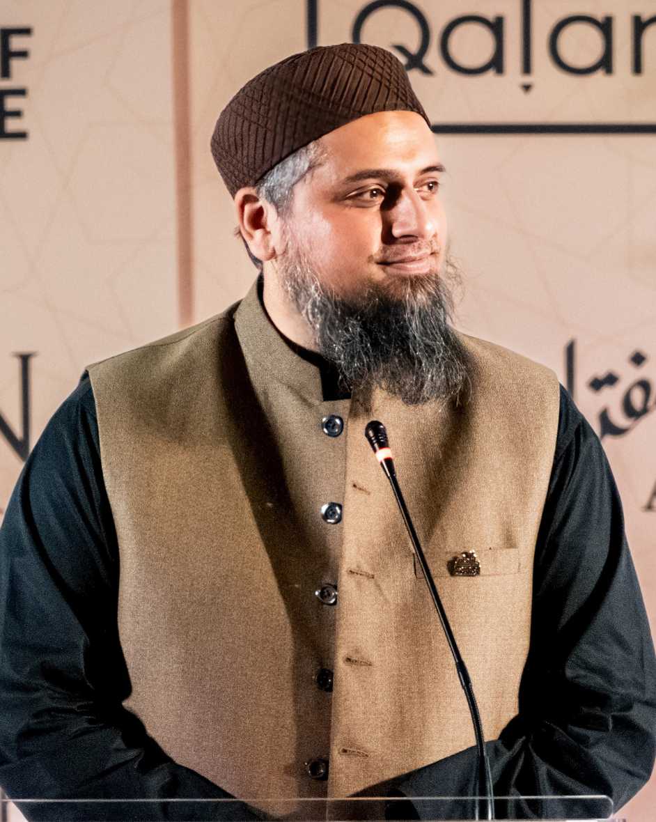 Photograph of Shaykh Furhan Zubairi giving a talk
