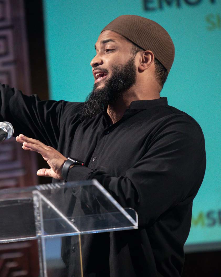 Mikaeel Ahmed Smith Giving a Talk